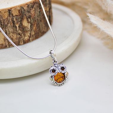 Twitt Twoo! How lovely is this 925 Sterling Silver Owl Necklace set with Cognac Amber and CZ. Comes complete with a 16-18inch chain.
